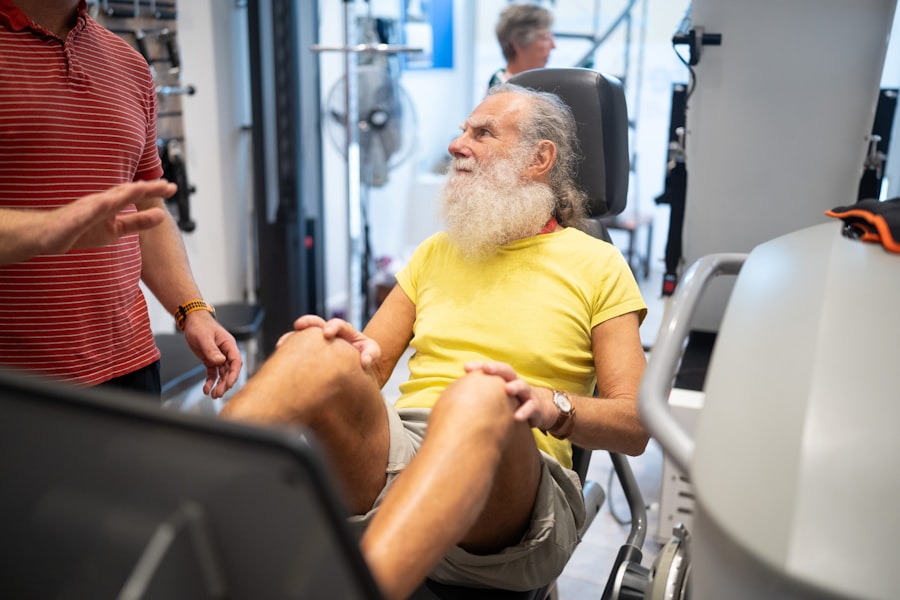 An older man doing guided leg exercises with a therapist